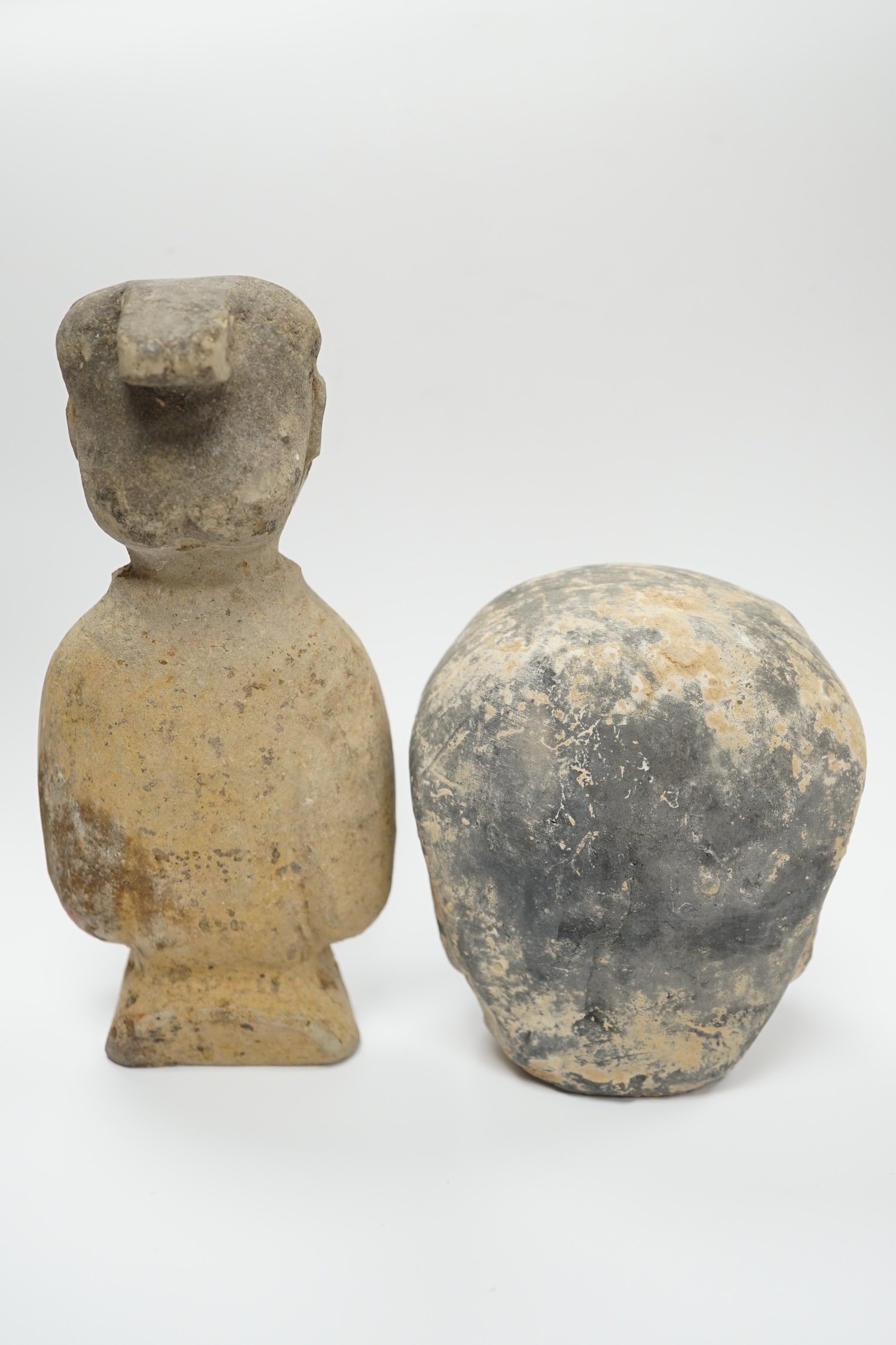 A Chinese grey pottery head and a bust, Han dynasty, tallest 17cm